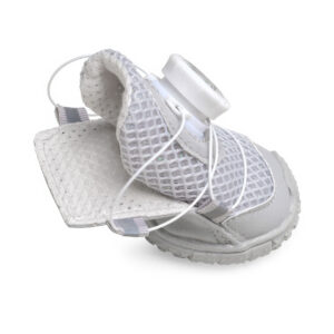 Close up look inside an ice white adjustable rotary buckle dog shoe showcasing the wide open entry collar path.