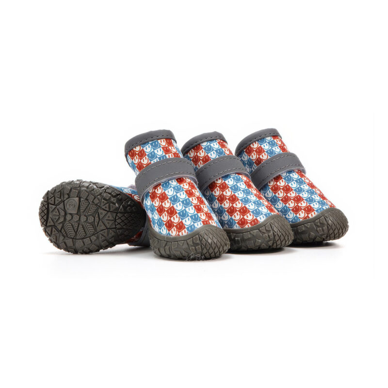 Blue and orange smile checker print anti-slip rubber sole paw protectors featuring matching grey ankle webbings.