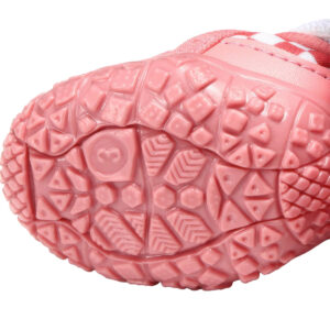 Pink Non-Slip Rubber Outsole Traction Profile Underneath profile of pink anti-slip rubber sole paw protectors detailing the deep non-slip geometric tread block lines.