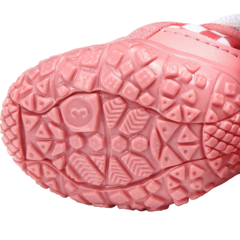 Pink Non-Slip Rubber Outsole Traction Profile Underneath profile of pink anti-slip rubber sole paw protectors detailing the deep non-slip geometric tread block lines.