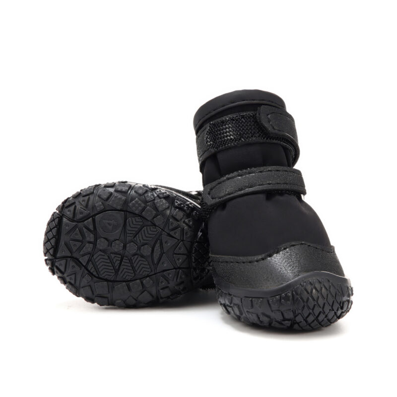 Thermoplastic Rubber Outsole Traction Tread Grid Detail Close look at the front bumper and deep geometric tread pattern lines on anti-slip TPR sole paw protectors.