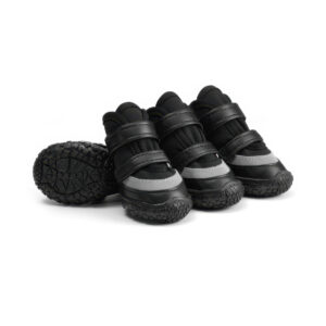 Stealth black anti-slip waterproof dog shoes featuring dark water-resistant panels, black leather wraps, and matching double straps.