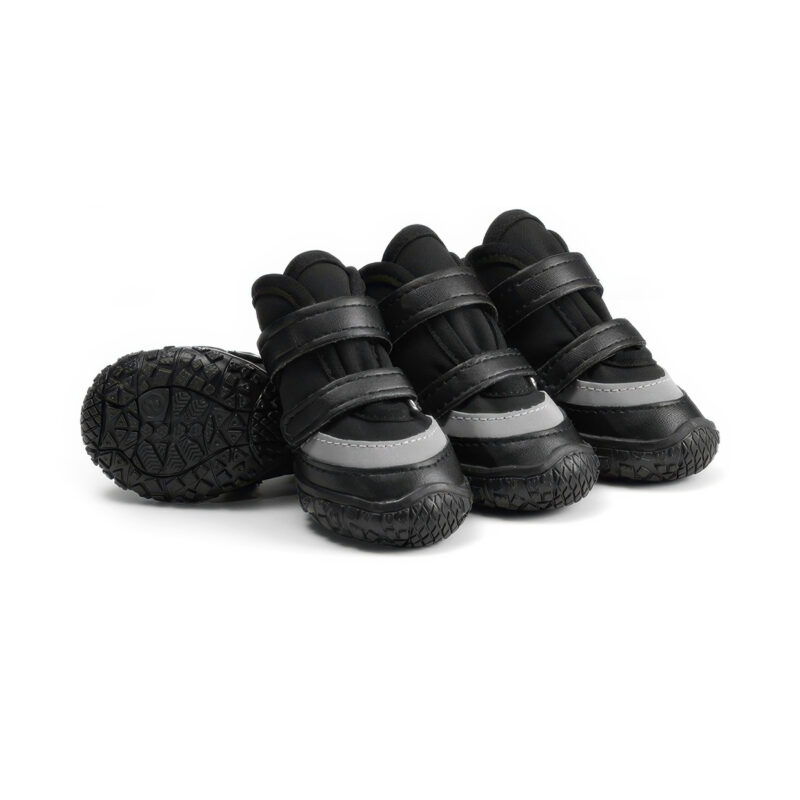 Stealth black anti-slip waterproof dog shoes featuring dark water-resistant panels, black leather wraps, and matching double straps.