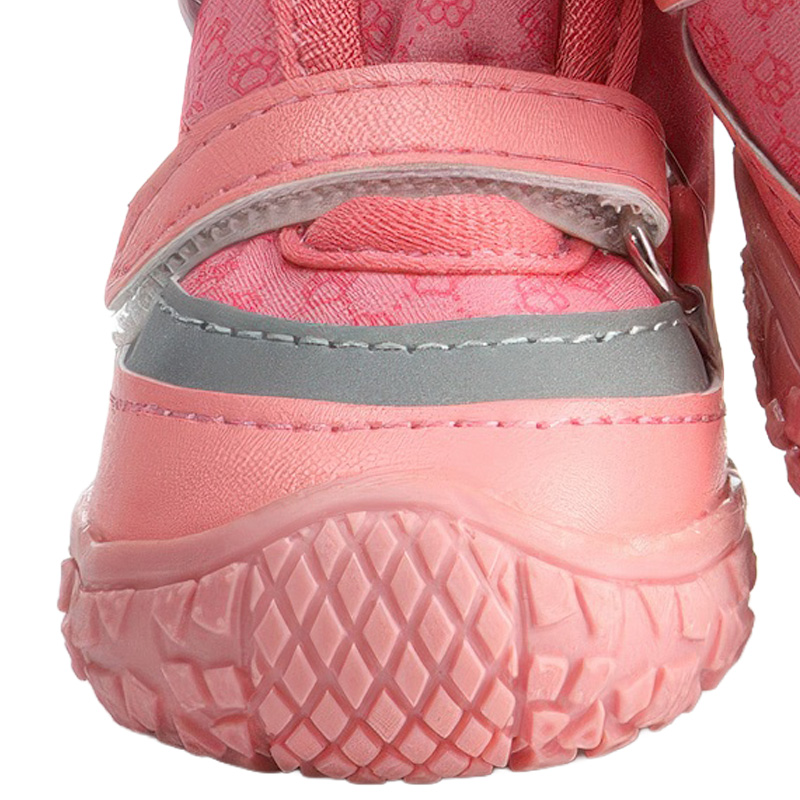 Profile detail of a pink dog boot showing a silver reflective panel, leather wrap, and thick wrapped toe guard bumper.