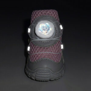 Front view of a lavender breathable dial-fit dog shoe showing white side tracking points glowing under dark conditions.