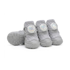 Silver gray breathable dial-fit dog shoes showcasing the front lacing dial mechanism, white sandwich mesh, and soft soles.