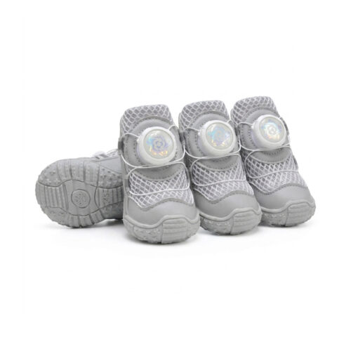Silver gray breathable dial-fit dog shoes showcasing the front lacing dial mechanism, white sandwich mesh, and soft soles.