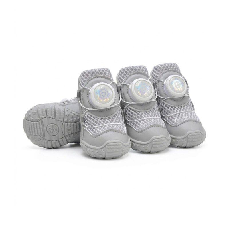 Silver gray breathable dial-fit dog shoes showcasing the front lacing dial mechanism, white sandwich mesh, and soft soles.