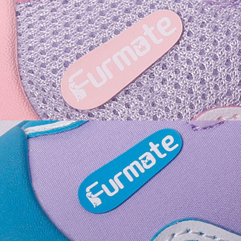 Split macro showing pink athletic open mesh fabric weave and purple water resistant sports dog shoes stretch paneling.