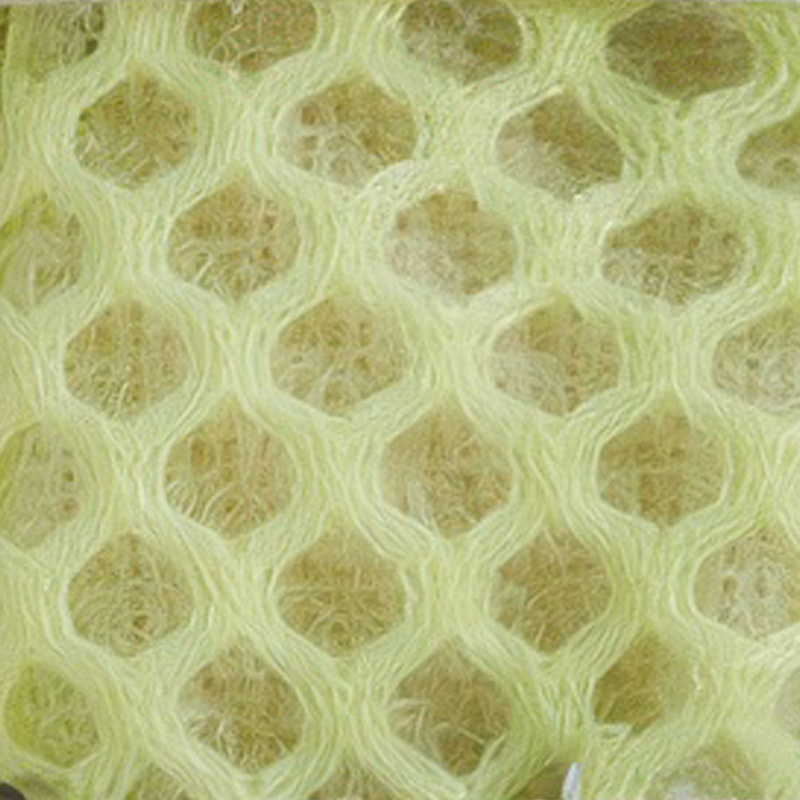 Macro view focusing on the technical multi-layered open sandwich mesh textile structure of breathable soft-sole dog shoes.