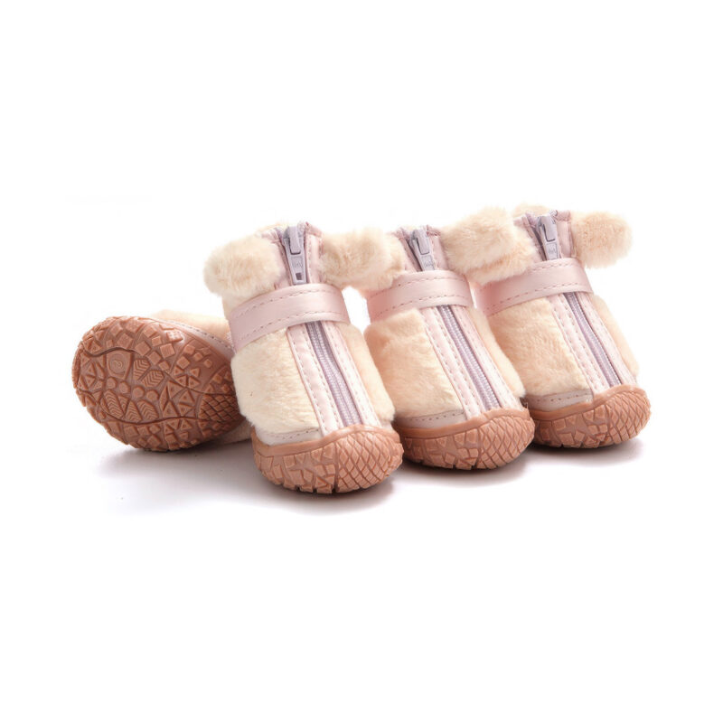 Blush pink cute faux fur warm dog shoes highlighting plush pink cuffs, pink zippers, and pink rubber outsoles.