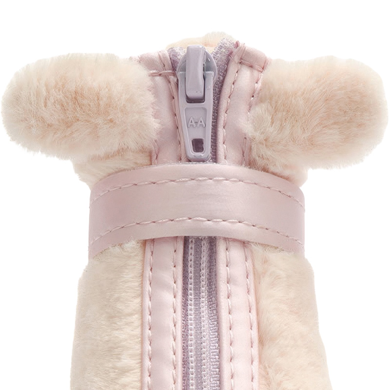Front angle detail showcasing a light pink zipper puller flanked by prominent matching plush animal ears on winter dog booties.