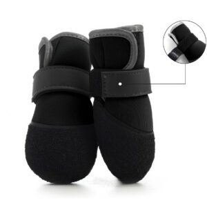 Close up of black dog shoes that stay-on using an extra wide adjustable baby grade velcro system.