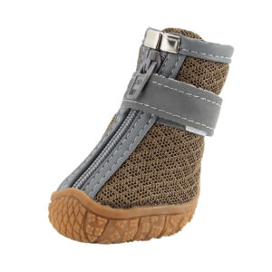 Non-Slip TPR Rubber Sole Close-up - Brown Close-up of brown dog shoes with zipper and straps highlighting the thick textured TPR anti-slip tread pattern.