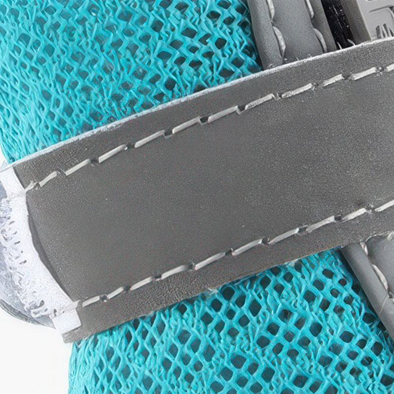 Close-up profile of the industrial hook-and-loop strap integrated with high-gloss 3M safety reflective strips.