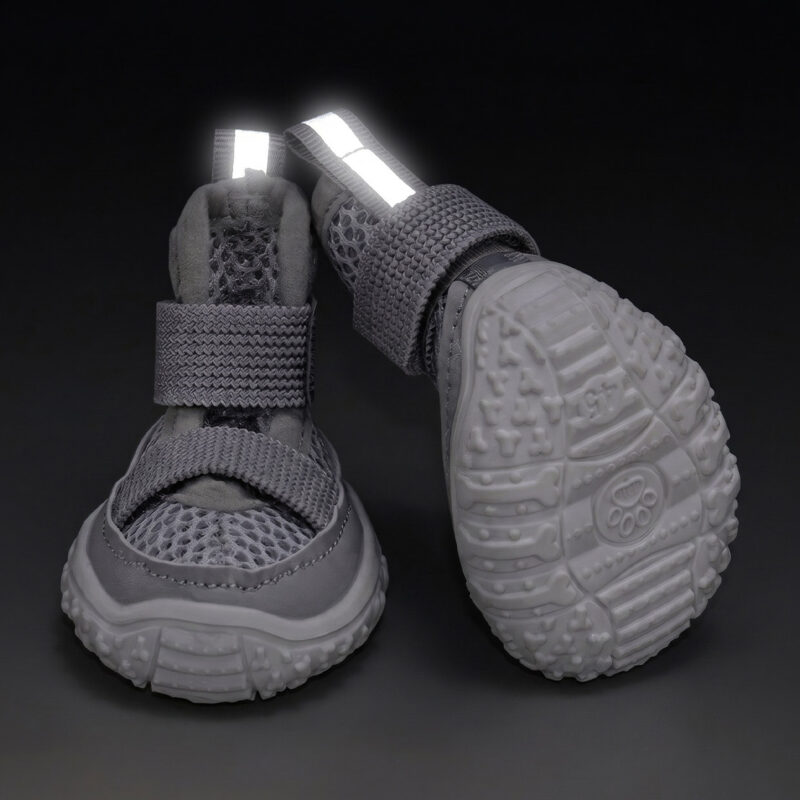 High Visibility Night Safety Reflective Strap Glow Close front view of gray double-strap breathable mesh dog sandals showing parallel silver strips glowing intensely in the dark.