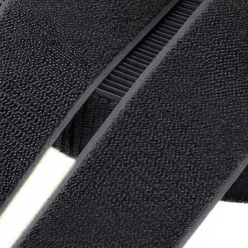 Macro texture view of the ultra-soft edge baby hook and loop fast closing band on double-straps secure fit pet shoes.