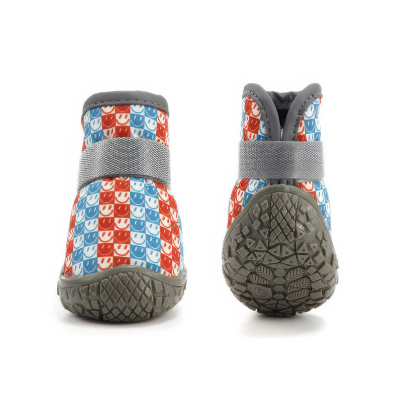 Front look next to the underside wavy tread of blue and orange double wrap strap stay-on puppy shoes.
