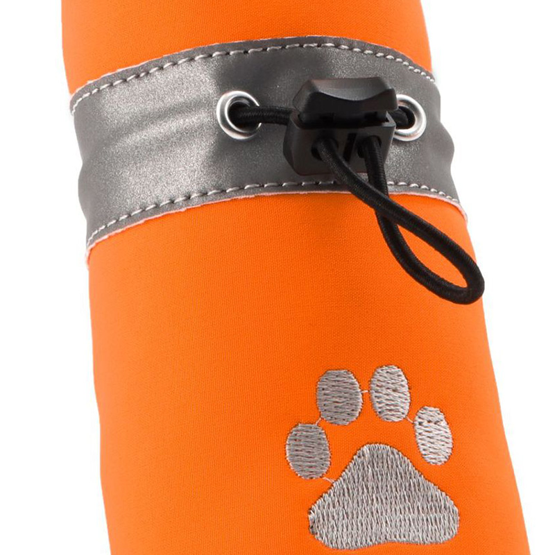Macro view focusing on the heavy-duty plastic toggle and elastic cord adjustable pet shoes locking collar layout.