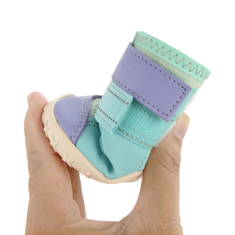 Flexible Rubber Sole Deformation Bending Test A hand squeezing hot pavement breathable dog shoes to demonstrate excellent sole flexibility and non deformation.