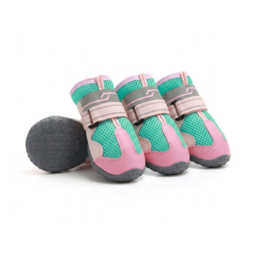 Pink and teal hot pavement breathable dog shoes showing the textured non slip rubber outsoles and grey straps.