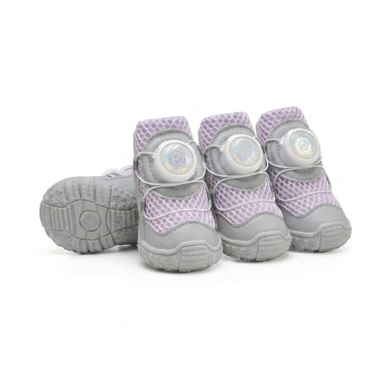 Pastel lavender mesh dog shoes for hot pavement displaying protective gray leather accents and white rotary buckle enclosures.