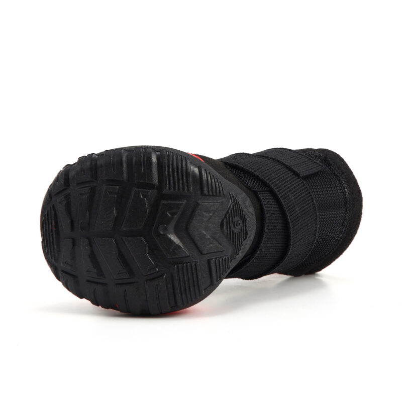 Anti Slip TPE Outsole Chevron Tread Pattern Underneath view of black no slip dog shoes with toe guard emphasizing the anti-slip chevron channel tread pattern.