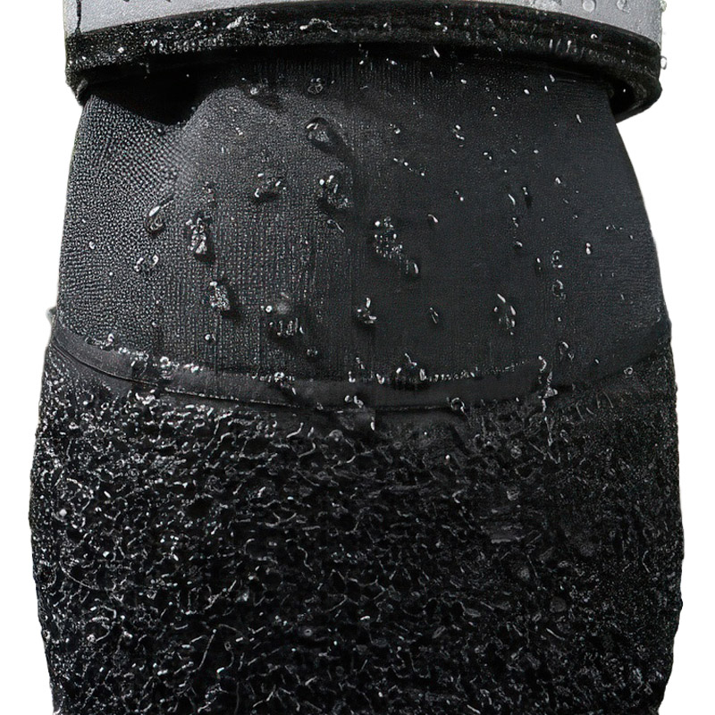 Water droplets beading seamlessly on the protective diving fabric upper of rainy day waterproof pet shoes.