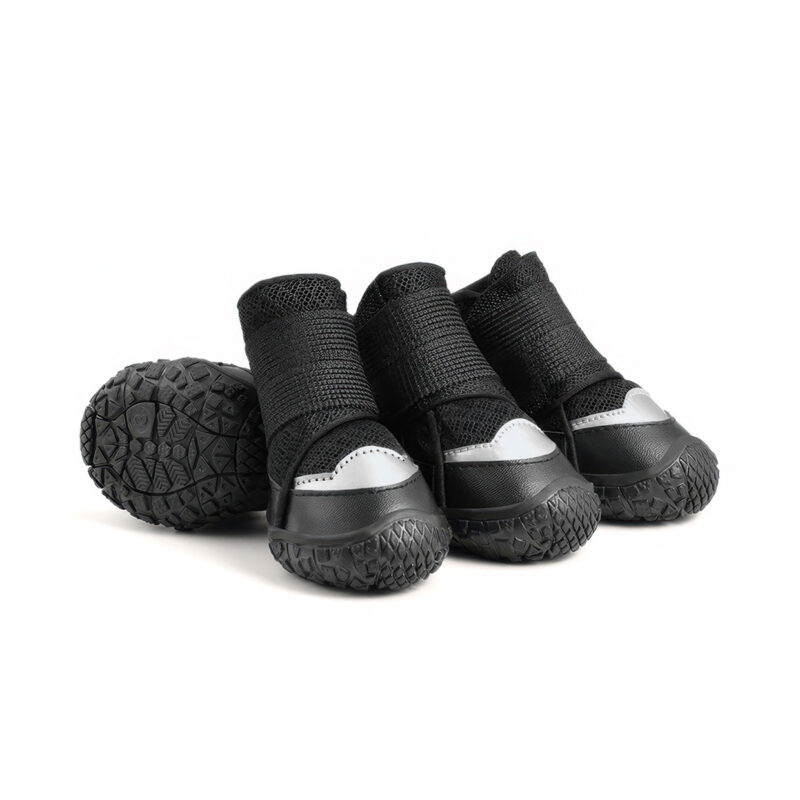 Stealth black reflective breathable dog shoes featuring dark sandwich mesh panels, black leather mudguards, and black straps.