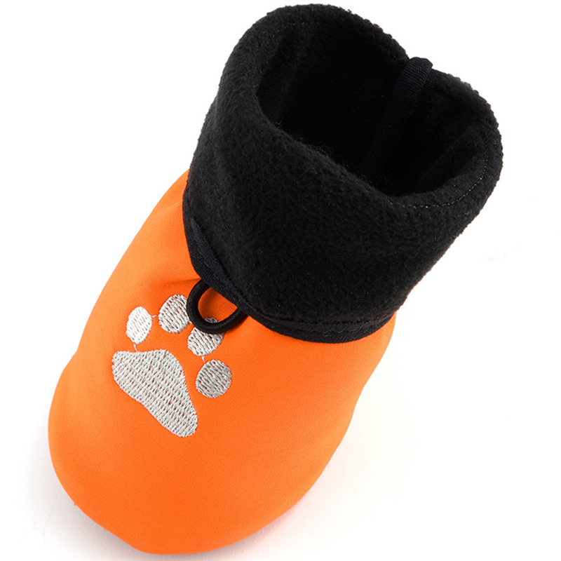 Top-down micro shot showing the premium soft-brushed polar fleece interior cuff lining of reflective fleece lined dog shoes.