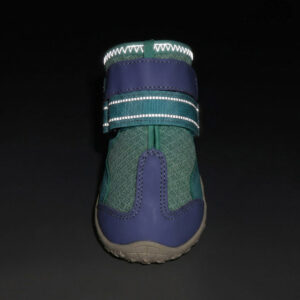 Night Safety High Visibility Reflective Strap Close up of purple reflective mesh shoes for dogs showing the ankle strap glowing brightly under dark conditions.