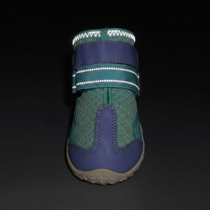 Night Safety High Visibility Reflective Strap Close up of purple reflective mesh shoes for dogs showing the ankle strap glowing brightly under dark conditions.