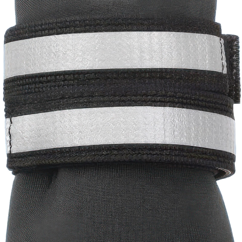 Close-up macro view of parallel silver high-gloss strips on secure fit double-strap pet shoes ankle fasteners.
