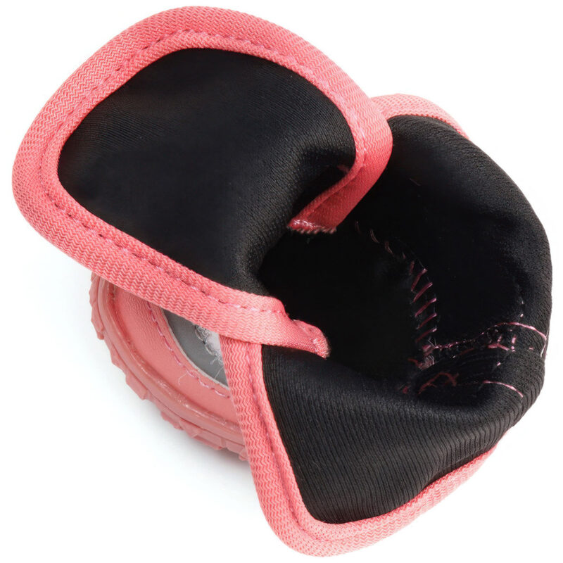 Top-down view inside a pink shoe showing the soft double-knit fabric footbed lining and comfortable black velvet edge piping.