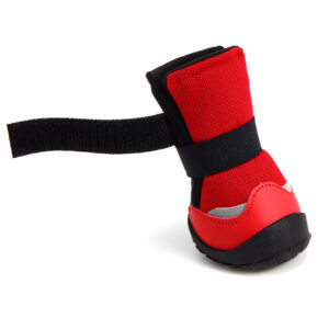Soft Baby Velcro Fastener Detail Close up of red soft mesh dog shoes for hot pavement emphasizing the unfastened soft edge baby hook and loop band.