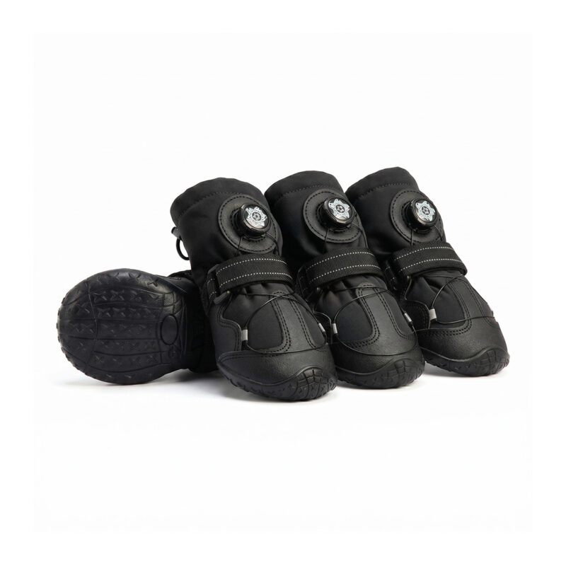 All-black stay-on dog shoes for active dogs featuring dual reflective ankle stitching and micro-adjustable dial closures.