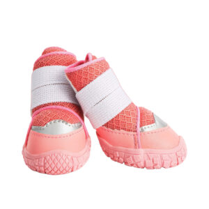 Front look at a pair of blush pink stay-on double-strap puppy shoes showcasing parallel white ankle hook and loop bands.