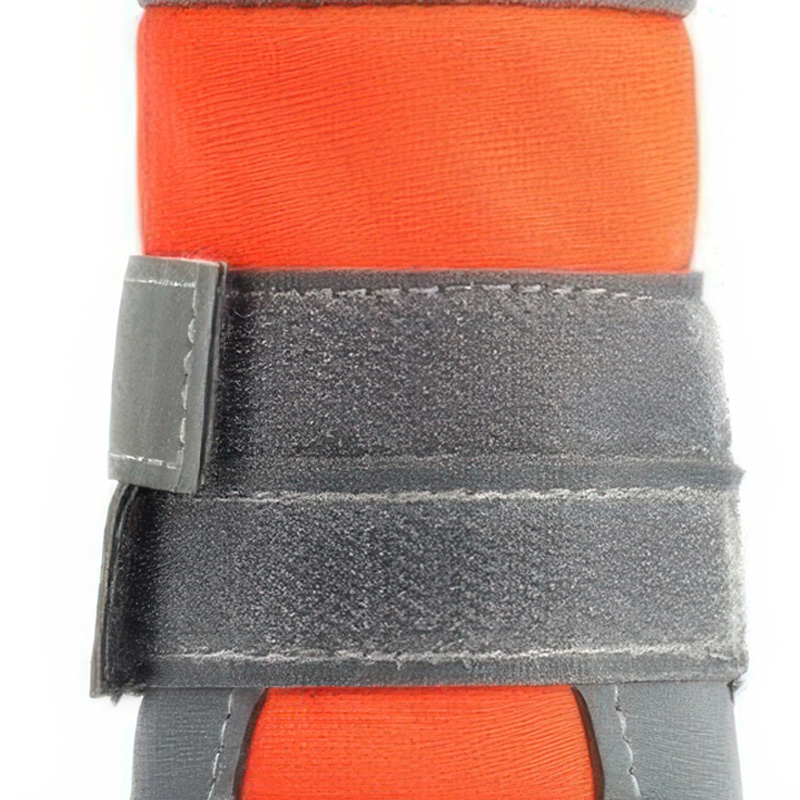 Macro texture view of the premium hook and loop fastening strip on stay-on drawstring shoes for dogs.