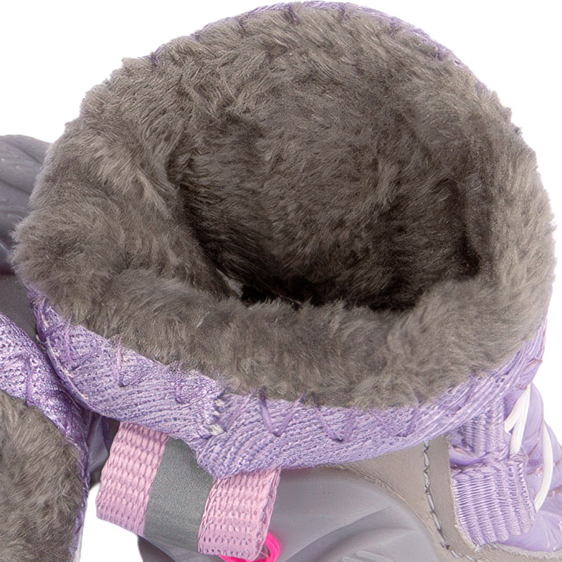 Top-down view inside a purple shoe showing the thick grey fleece insulation layer on warm plush lined paw protectors.