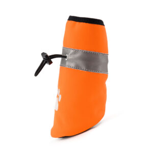 Side profile of orange water-resistant soft-sole paw protectors showing clean aerodynamic stitching and a high-wrapped black heel.