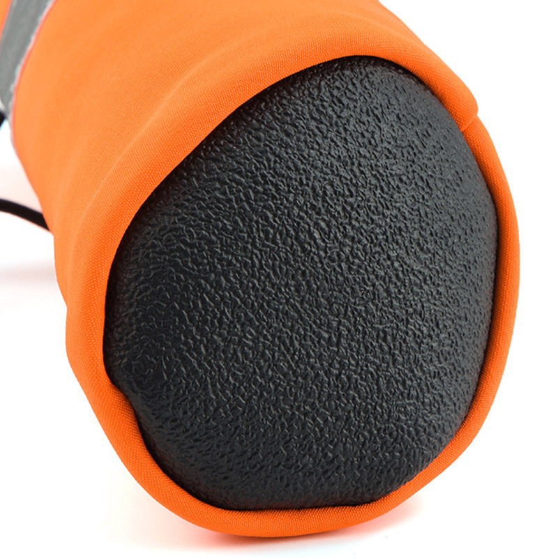 Underneath close-up texture emphasizing the anti-slip pebble grain mapping on water-resistant soft-sole paw protectors.