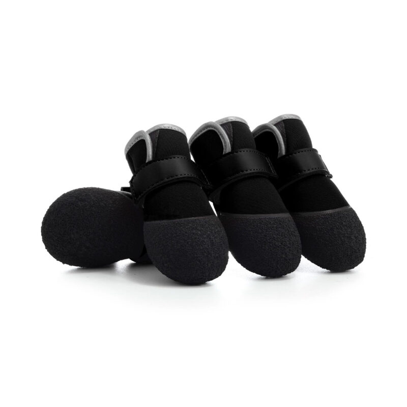 Black waterproof all-weather paw protectors with adjustable wide velcro ankle straps for muddy walks.