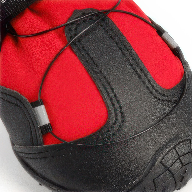 Close-up profile of high-tensile structural adjustment cables routed across the upper leather patch of dial-fit shoes.