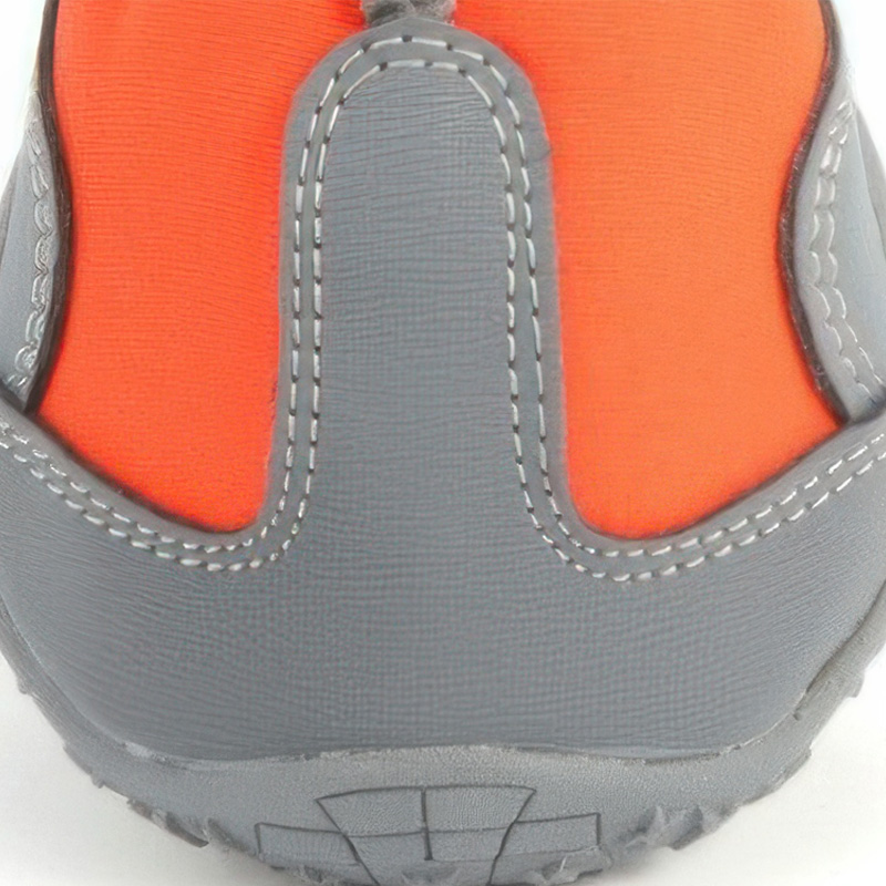 Detailed close-up macro view highlighting the tight double-stitched leather panels on waterproof high-top dog shoes.