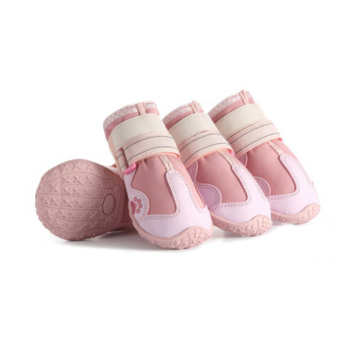Pink Waterproof Warm Dog Shoes Pack Pink waterproof warm dog shoes displaying the anti-slip rubber outsole pattern and wide safety fastening straps.