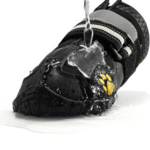 Hydrophobic Fabric Shell Water Resistance Test Water pouring directly onto a black waterproof warm dog shoe to demonstrate the nano-porous water-repellent fabric shell.