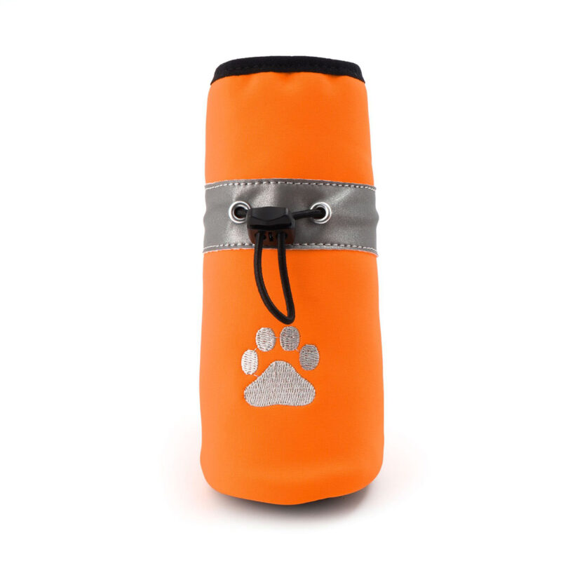 Front centered shot of an orange winter water-resistant fleece dog shoe highlighting symmetrical paw embroidery.