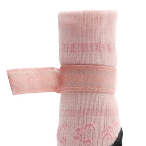 Close-up of the heavy-duty micro-hook velcro anchoring strap system on adjustable elastic dog socks.