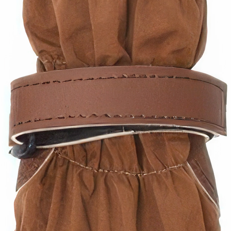 Detailed view of multi-row elastic ruched stitching and dense hook-and-loop strap on adjustable long sleeve dog boots.