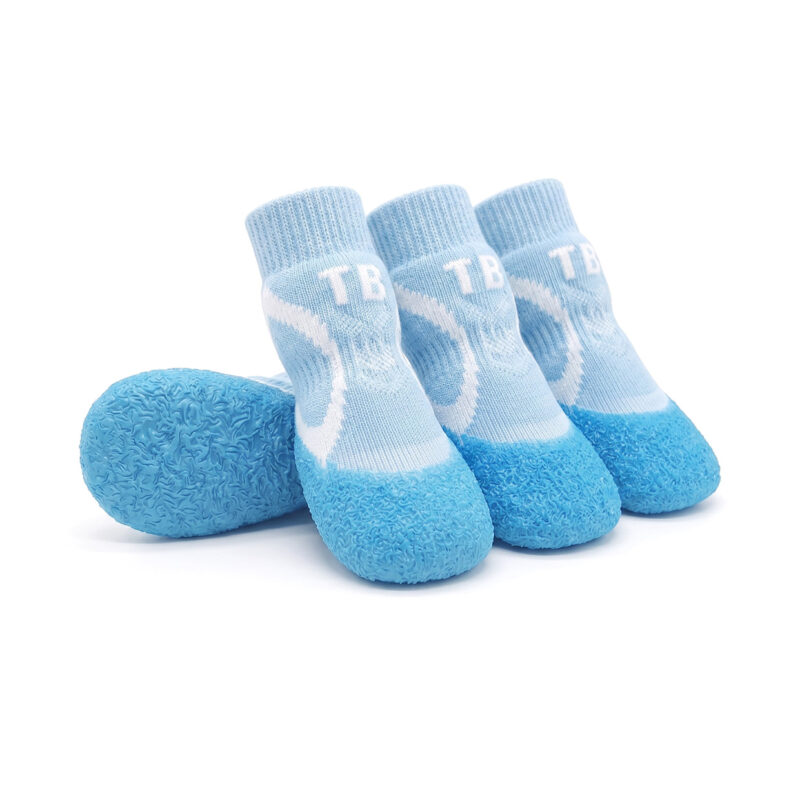 Sky blue all-weather paw protectors showing white knit side graphics and a seamless molded light blue rubber shell.